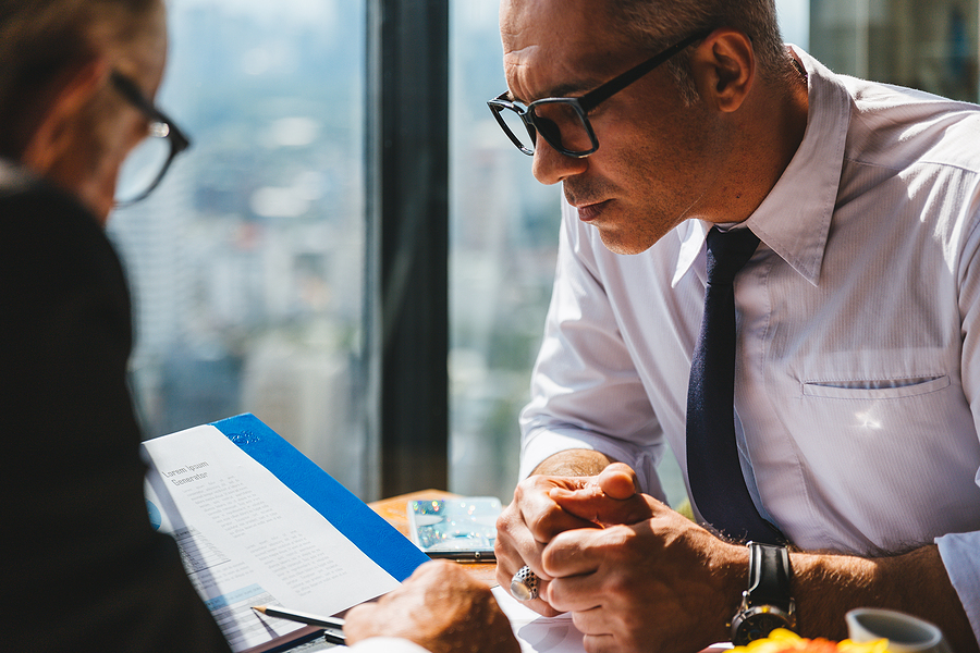 Expert professionals analyzing data, brainstorming solutions, and collaborating for optimal outcomes.